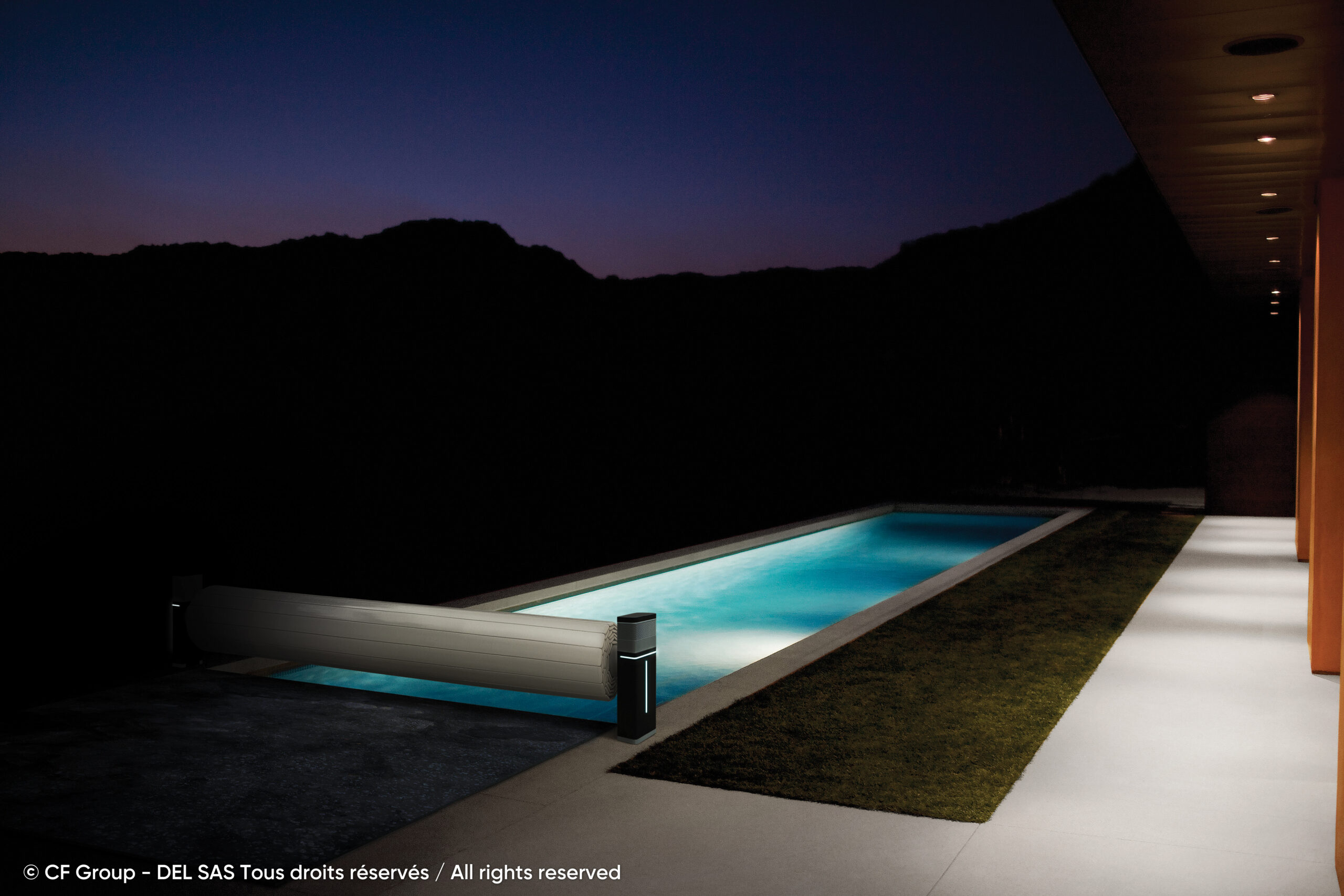 Exterior of modern house and swimming pool at night
